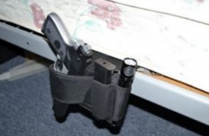 typical bedside gun holster to hide a gun in your bedroom