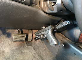 how to hide a gun in a car with a gun magnet below the steering wheel