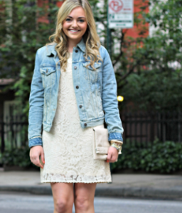 jean jacket covering gun with dress